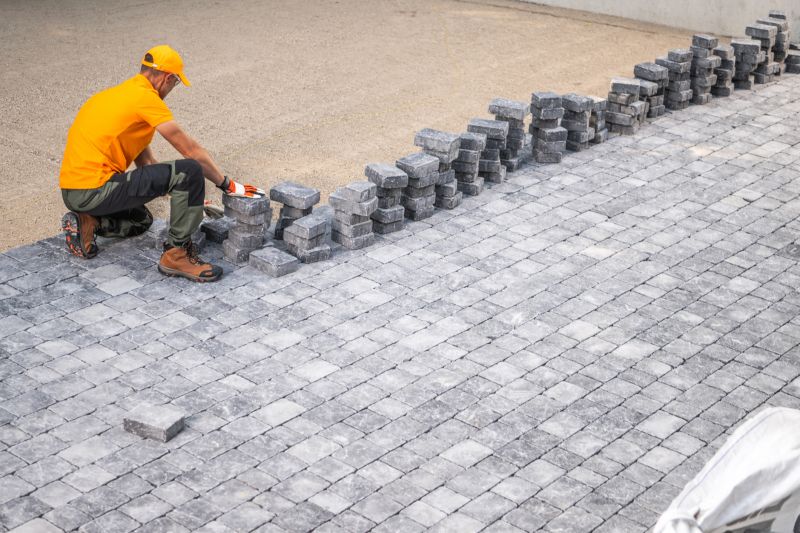Expert Pavers Installer at Work